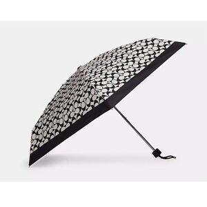 Coach black white travel compact umbrella w/pom pom wristlet